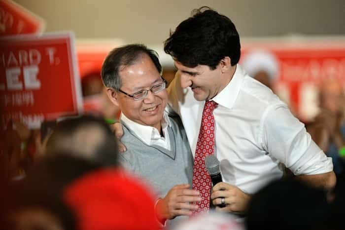 Prime Minister Justin Trudeau embraces Burnaby South Liberal candidate Richard Lee at a campaign event at the Shadbolt Centre for the Arts.