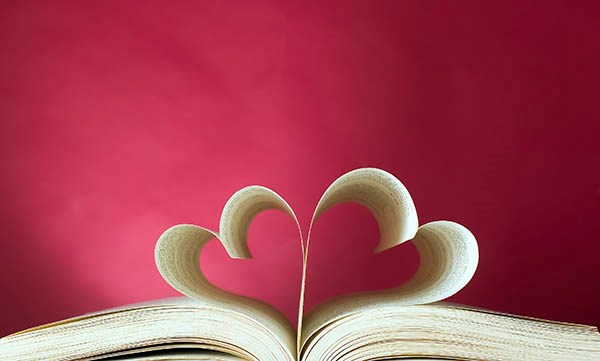  Opened book with heart shapes / iStock
