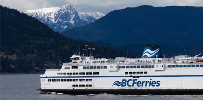  VANCOUVER, BC - September 18: A BC ferry crossing Howe Sound to Sunshine Coast on nice and sunny day. BC ferries is becoming a costly way to get around with no alternative on September 18, 2017 / Shutterstock