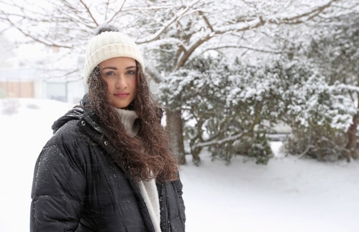  Meghan Calland was among several hundred passengers who were stranded for several hours at Swartz Bay ferry terminal on Sunday. Vehicle access to the terminal became difficult when snow started to fall in the late afternoon. Evening and night service on bus routes 70, 72 and 75 was cancelled. Photo by Adrian Lam/Times Colonist