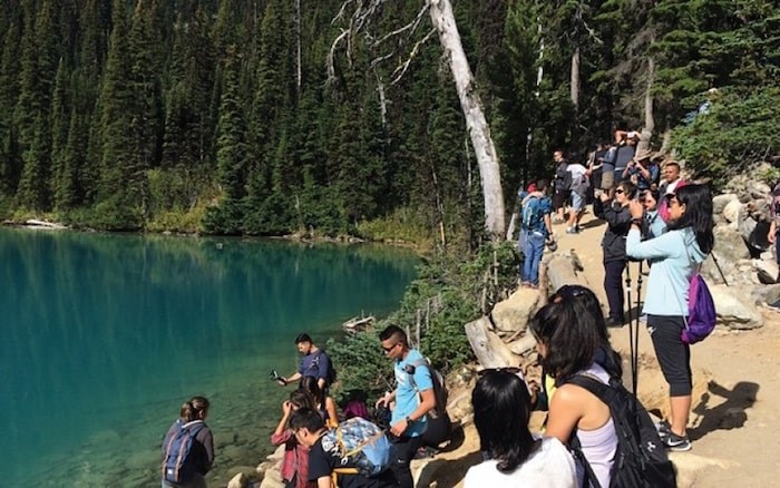  Cpl. Mike Hamilton was overwhelmed by the crowds at Joffre Lakes Provincial Park when he tried to regulate parking on a chaotic morning in early August. Photo by Joel Barde