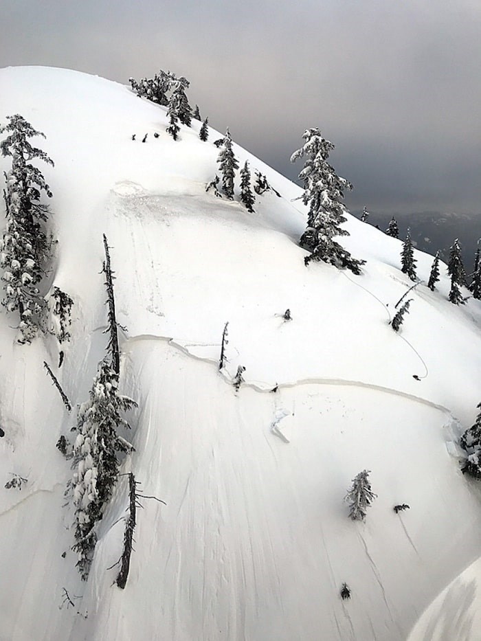  The search for a missing hiker is set to resume Wednesday on Runner Peak, shown here after Monday’s avalanche. Photo courtesy North Shore Rescue