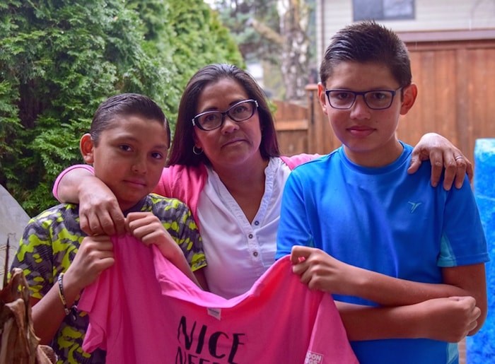  Christian Higgs Torres (right) and Patrick Higgs Torres (left) were shocked when their bully turned up at school wearing a pink T-shirt on Pink Shirt Day in 2013. Their mother, Eréndira Torres Piña, says Pink Shirt Day is meaningless. Photo: Megan Devlin/Richmond News