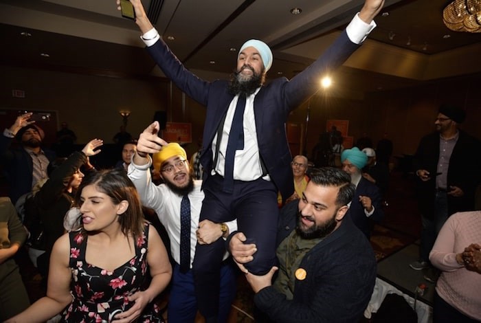  Jagmeet Singh is carried around by the crowd at his victory party Monday night. Photo by Jennifer Gauthier.