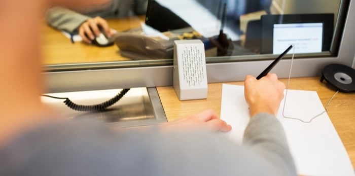  Bank teller window/Shutterstock