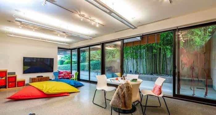  On the lower level is a comfortable family/play room that opens up to a side patio with a bamboo garden. Listing agent: Faith Wilson