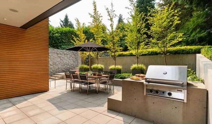  The patio at the back of the house has an awesome concrete built-in BBQ. Listing agent: Faith Wilson