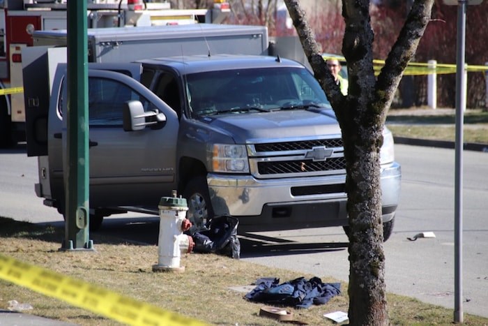  A police vehicle that carries police dogs was damaged Monday in a hit-and-run incident. Photo by Shane Mackichan