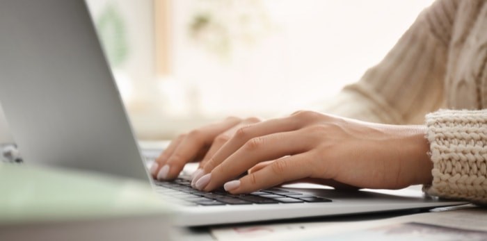  Woman using laptop/Shutterstock