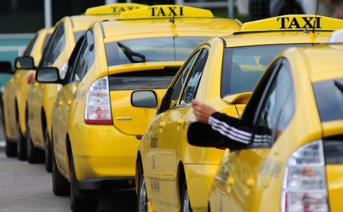  Row of taxi cabs. File photo, North Shore News.