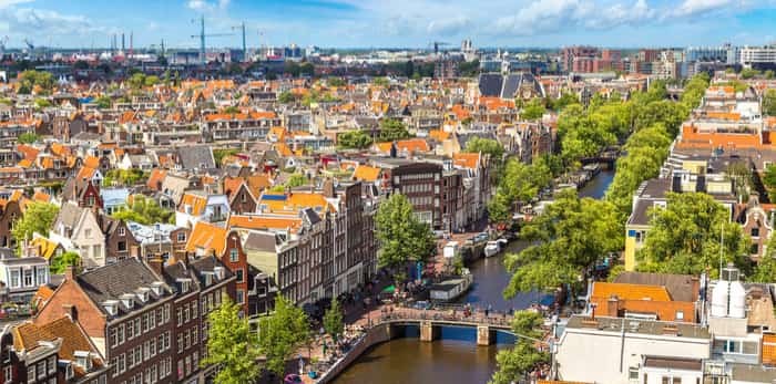  Panoramic aerial view of Amsterdam on a beautiful summer day, The Netherlands / Shutterstock