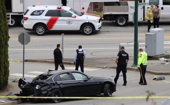  One person was killed and two other pedestrians hurt in a car crash Monday afternoon, March 25 at the intersection of Mariner Way and Riverview Crescent in Coquitlam. Photo by Shane Mackichan.