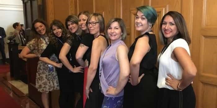  Bhinder Sajan, right to left, Shannon Waters, Liza Yuzda, Justine Hunter, Jen Holmwood, Katie DeRosa, Tanya Fletcher and Kylie Stanton pose for a photo at the B.C. Legislature in Victoria on March 28, 2019. The Speaker of B.C.'s legislature says a preliminary review of the building's dress code now permits women to wear sleeveless dresses and sleeveless shirts. THE CANADIAN PRESS/Dirk Meissner