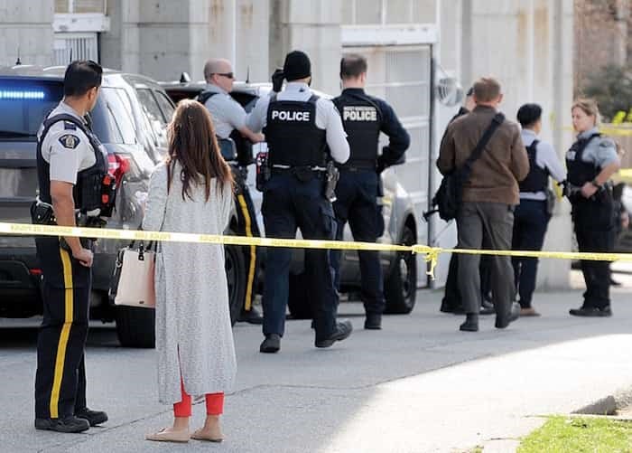  Police investigators spoke to witnesses and gathered evidence at the scene of a shooting in North Vancouver near 12th and Lonsdale Tuesday afternoon. photo Mike Wakefield, North Shore News