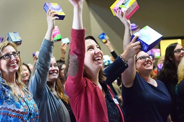  Participants in the United Way of the Lower Mainland's Tampon Tuesday campaign hold up donated tampons, pads and diva cups at a wrap-up event at the United Way's Burnaby headquarters in March 2018. Photograph by CORNELIA NAYLOR