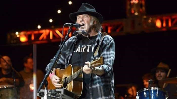  Neil Young will be performing solo at the Queen Elizabeth Theatre in Vancouver on May 15 with Elvis Costello also playing a solo set. Tickets go on sale Saturday at 10 a.m.