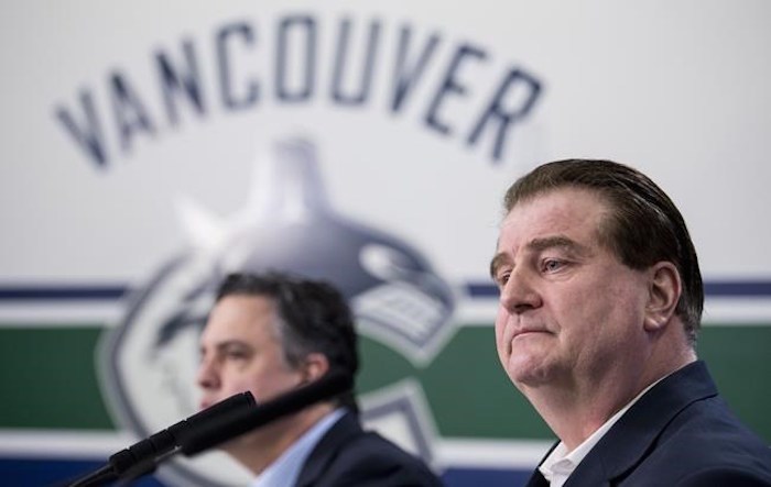 Vancouver Canucks general manager Jim Benning, right, and head coach Travis Green pause for a moment during a news conference at Rogers Arena in Vancouver on Monday, April 8, 2019. The Canucks finished their season this past weekend failing to make the 2019 playoffs. THE CANADIAN PRESS/Jonathan Hayward