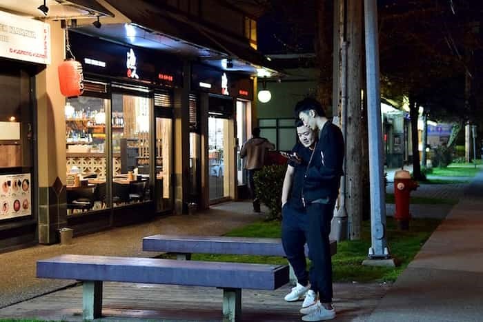  Viva Aouo waits with a friend for a table at Busy Cows. Photo: Megan Devlin/Richmond News