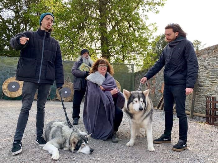  Writer Jennifer Bain gets to meet the Northern Inuit dogs that appeared as pups in Game of Thrones. Their owners, Caelan (left) and Ross (right) Mulhall, along with their dad William (back) all appeared as extras in the show.