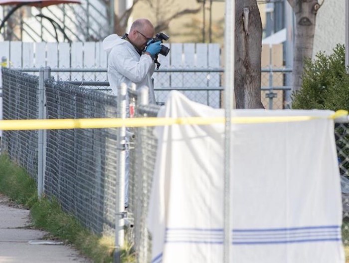  RCMP officers work outside a crime scene in Penticton, B.C., on Monday April 15, 2019. The RCMP say a 60-year-old man is in custody after four targeted shootings in Penticton, B.C., on Monday left two men and two women dead in what a senior police officer described as a 