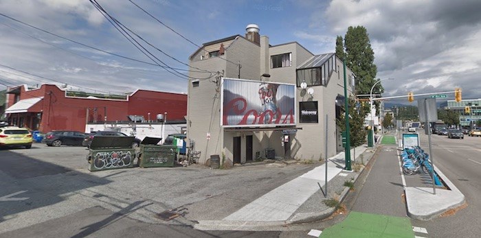  The victim was gunned down while he was in his parked vehicle under this billboard on Burrard at West Fourth, as seen in August 2018 on Google Street View. 