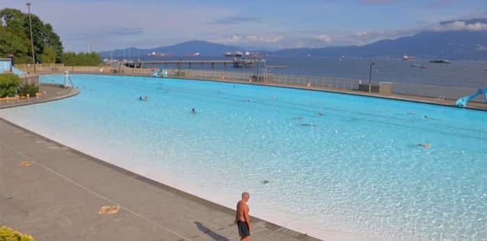  VANCOUVER - July 10,2017: Adults enjoy a morning swim in the Kitsilano outdoor pool in Vancouver, British Columbia on July 10, 2017.