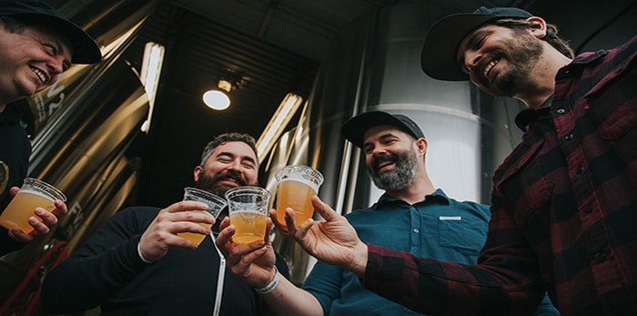  Collaborating brewers Ben Coli and Mitchell Warner (Dageraad Brewing), Brent Mills (Four Winds Brewing Co.), David Bowkett (Powell Brewery) at the 2019 VCBW Brew Day. Photo by Two Peas Photography.