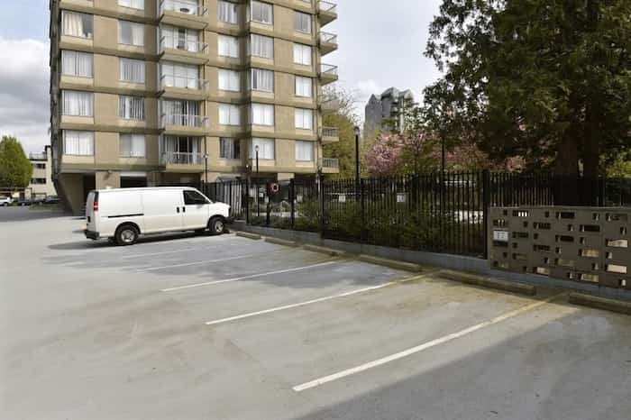  Apartment buildings in Vancouver, including this one at 1305 West 12th Avenue, continue to have empty parking spots. Photo Dan Toulgoet