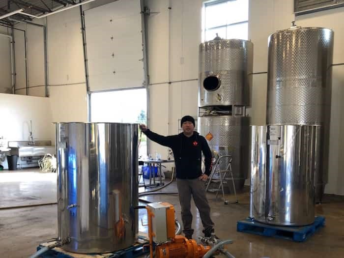  Frank Shang, owner of Richmond-based Fraser Sun Winery is getting ready to bottle 30,000 litres of blueberry wine. Photo: Submitted by Shang