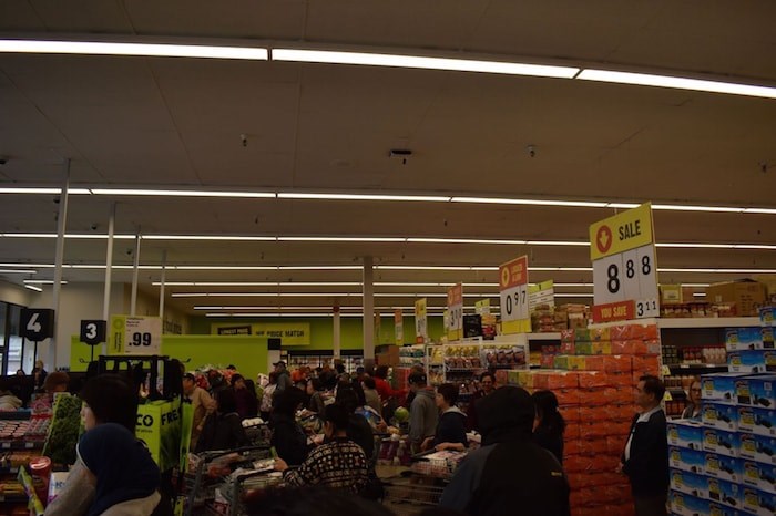  Huge lineups to the check outs inside FreshCo's Blundell location. Photo by Alvin Chow