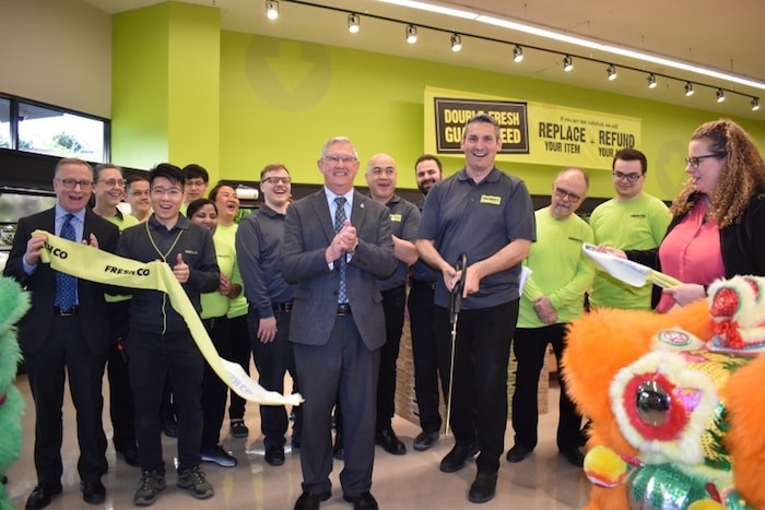  FreshCo Broadmoor celebrates its grand opening with a ribbon cutting ceremony attended by Richmond Coun. Bill McNulty. Photo by Alvin Chow.