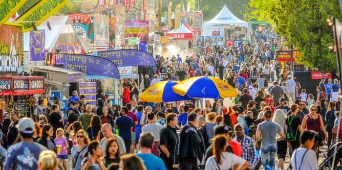  Vancouver, British Columbia / Canada - August 30, 2018: Thousands enjoy a beautiful day at the Pacific National Exhibition / Shutterstock