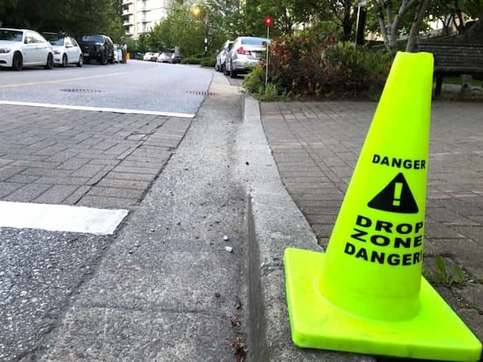  This road cone has been added to a crosswalk on University Crescent on Burnaby Mountain. The crosswalk is often ignored or unseen by speeding drivers as they come down the slope. CHRIS CAMPBELL PHOTO