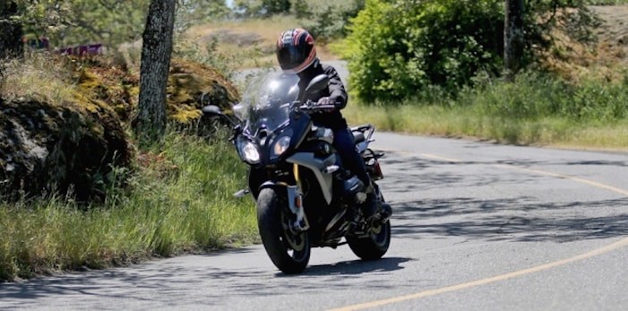  Chris Chong, of the Lower Island Riding Club, rides Mount Tolmie. 