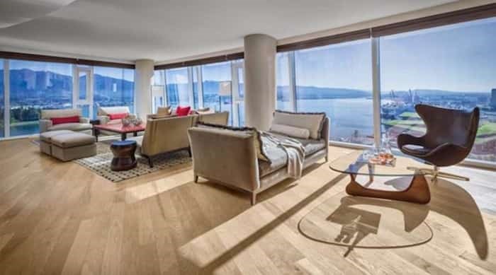  The expansive living space has various seating areas and floor-to-ceiling windows all the way around, to let in the light and those epic views. Listing agent: Leanne Lim