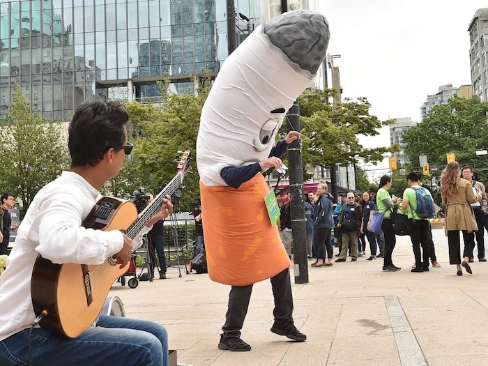 A dancing mascot dressed up as a cigarette butt named Ashley wants you to stop throwing cigarette butts on the ground. Photo by Dan Toulgoet/Vancouver Courier