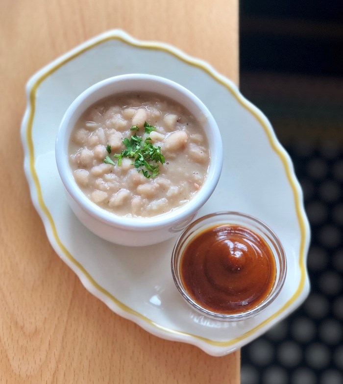  A side of French white beans with ham hock and BBQ sauce. Photo by Lindsay William-Ross/Vancouver Is Awesome