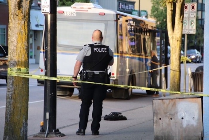  Burnaby RCMP were called to Hastings Street at Carleton Avenue on Tuesday afternoon after a pedestrian was struck by a transit bus. Photo by Shane Mackichan 