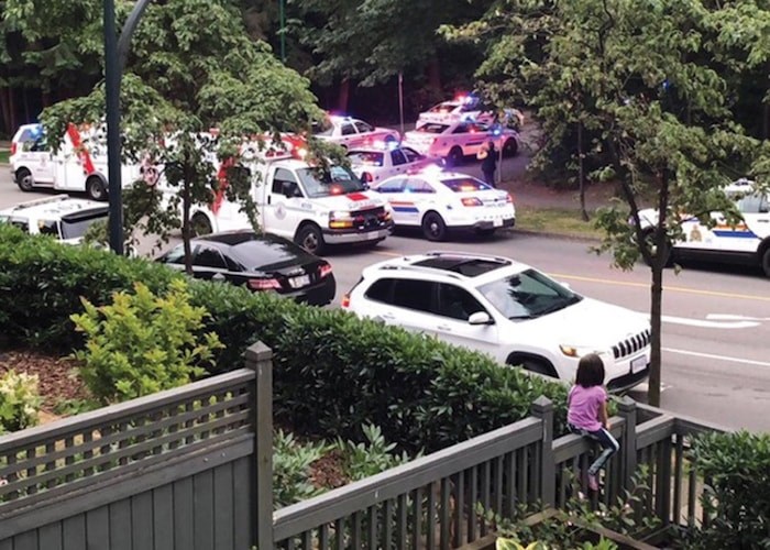  Residents reported a heavy police presence in a Lynn Valley neighbourhood Thursday evening after an intruder entered several apartments in a local condo complex. Photo supplied.