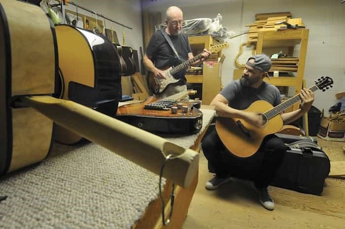  North Vancouver luthiers John Regehr and Robert Bustos both honed their craft at Larrivée Guitars. When the company moved south five years ago Bustos invited Regehr to join him in a new partnership, Vancouver Guitar Finishing. photo Mike Wakefield, North Shore News