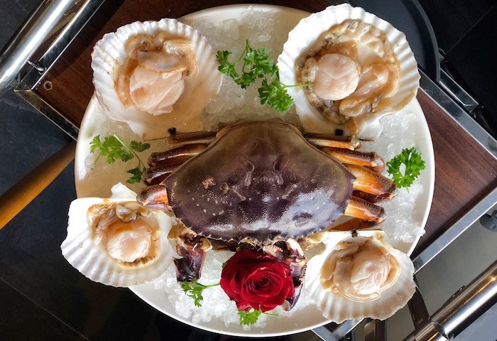  Crab and live scallops await steaming. Photo by Lindsay William-Ross/Vancouver Is Awesome