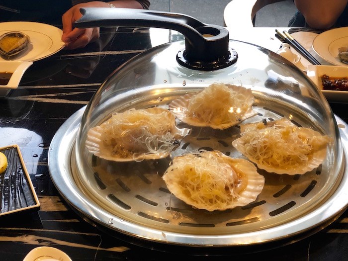  Live scallops topped with glass noodles being steamed. Photo by Lindsay William-Ross/Vancouver Is Awesome