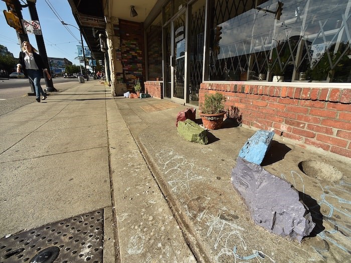  An employee of Antisocial says the rocks outside the shop were there long before the Main Street skateboard store opened. Photo by Dan Toulgoet/Vancouver Courier