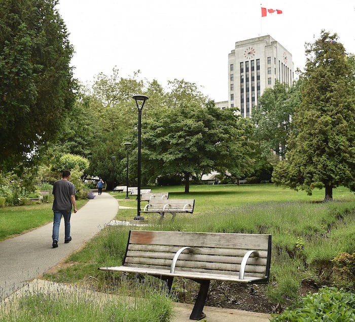  Benches, such as these found at city hall, are divided by an arm rest that prevents people from sleeping on them. Photo by Dan Toulgoet/Vancouver Courier