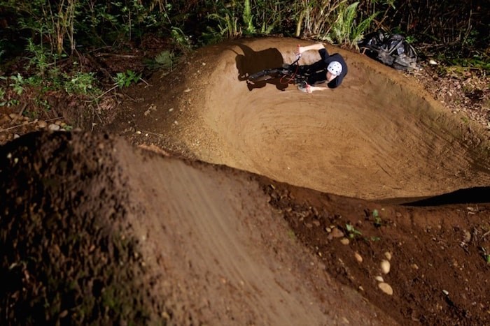  BMX bikers have built an extensive network of berms and jumps in a conservation area in North Burnaby.