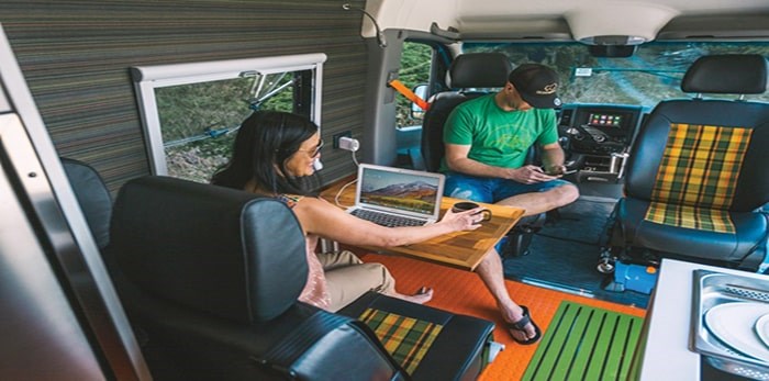  Nomad Vanz co-founding couple Christina Yau and John Syslak relax in one of their custom creations. photo supplied Nomad Vanz