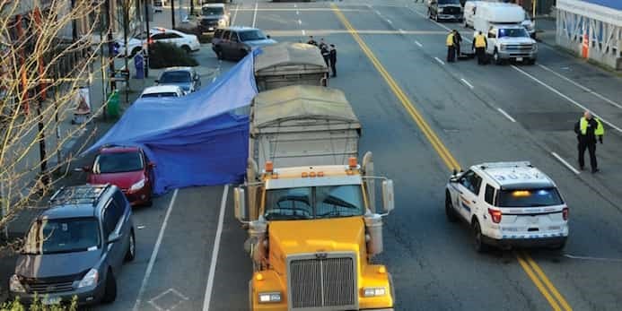  Police blocked off West Esplanade for hours as they investigated the death of a cyclist on Jan 27, 2019. A North Vancouver man has now been charged. Photo Cindy Goodman / North Shore News