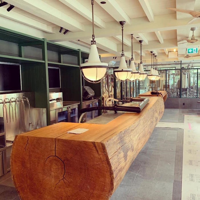  A log bar installed inside the brewpub space. 