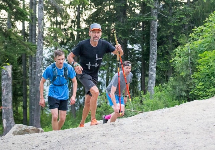  Wilfrid Leblanc leads a group of climbers on one of his 19 ascents of the Grouse Grind during a record-setting day June 21. Photo courtesy Grouse Mountain