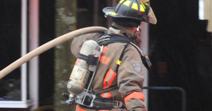  City of North Vancouver firefighters put out a fully engulfed parked car in an underground parkade in Upper Lonsdale Monday morning. File photo/North Shore News